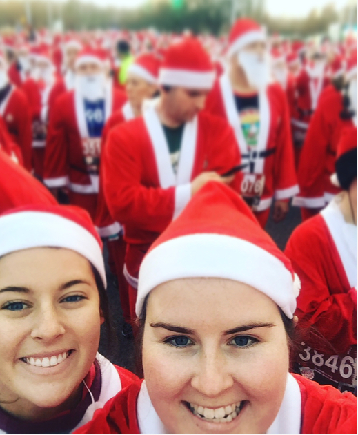 Marnie Blalock (right) helped break the world record for the largest Santa run at the 2016 Surf-n-Santa 5 Miler in Virginia Beach.