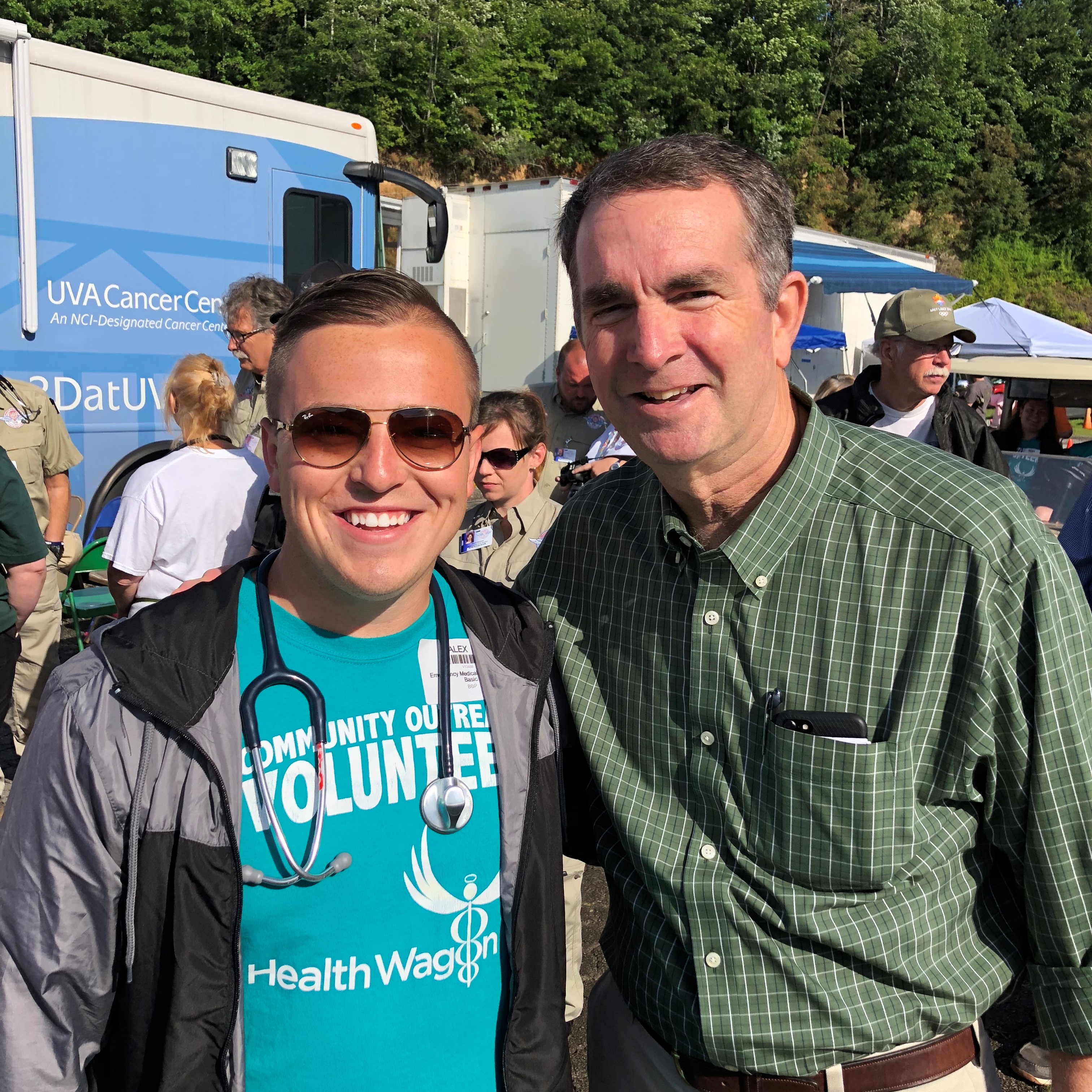 Alex Robinson met Virginia Gov. Ralph Northam at the free pop-up health clinic where he has volunteered the last five years.