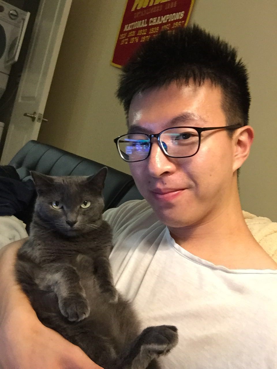 Chenxuan Zhou has lived in five cities and rescued two cats along the journey.