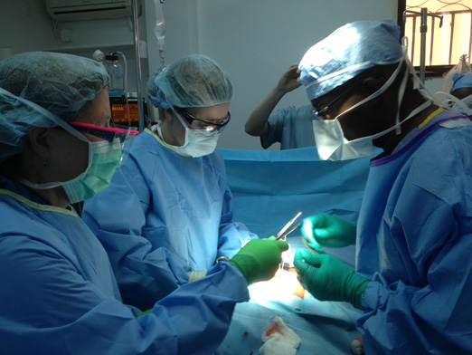 The Community Coalition for Haiti aims to not only provide care but to also train Haitian physicians and nurses. Here Haitian physician, Dr. Francois St. Louis is training in the OR.