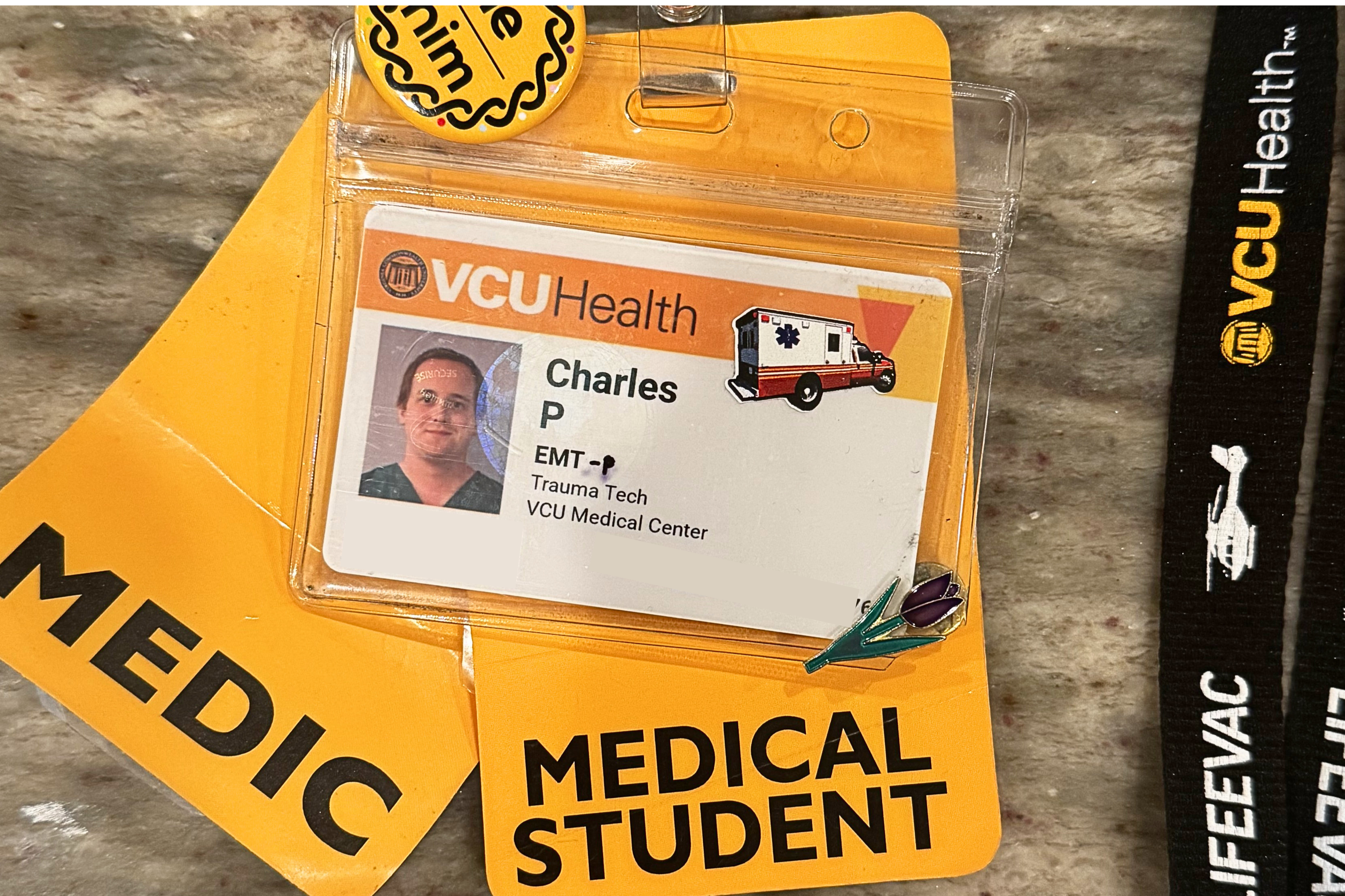 Charles Payne proudly wears his TULIP Award pin on his VCU Health badge. Contributed photo.