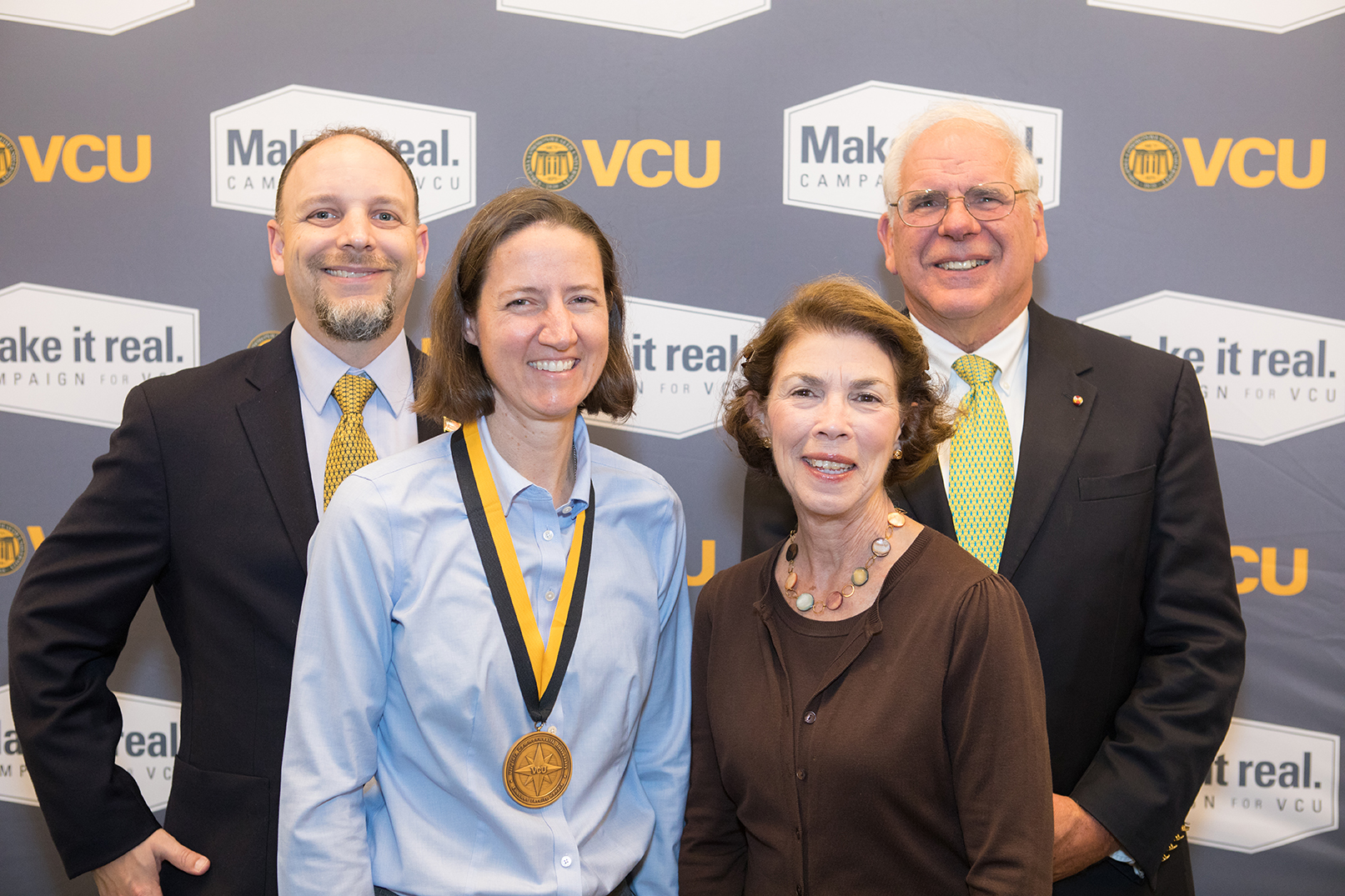 Beverley B. Clary Chair Victoria Kuester, M.D., H’06 (second from left), with husband Karl Kuester (far left), Kathryn H. Clary and Richard M. Clary, M’74, who established the chair with his family to honor the memory of his late father, a 1939 alumnus of the Medical College of Virginia.