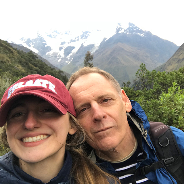 man and woman on a mountain hike