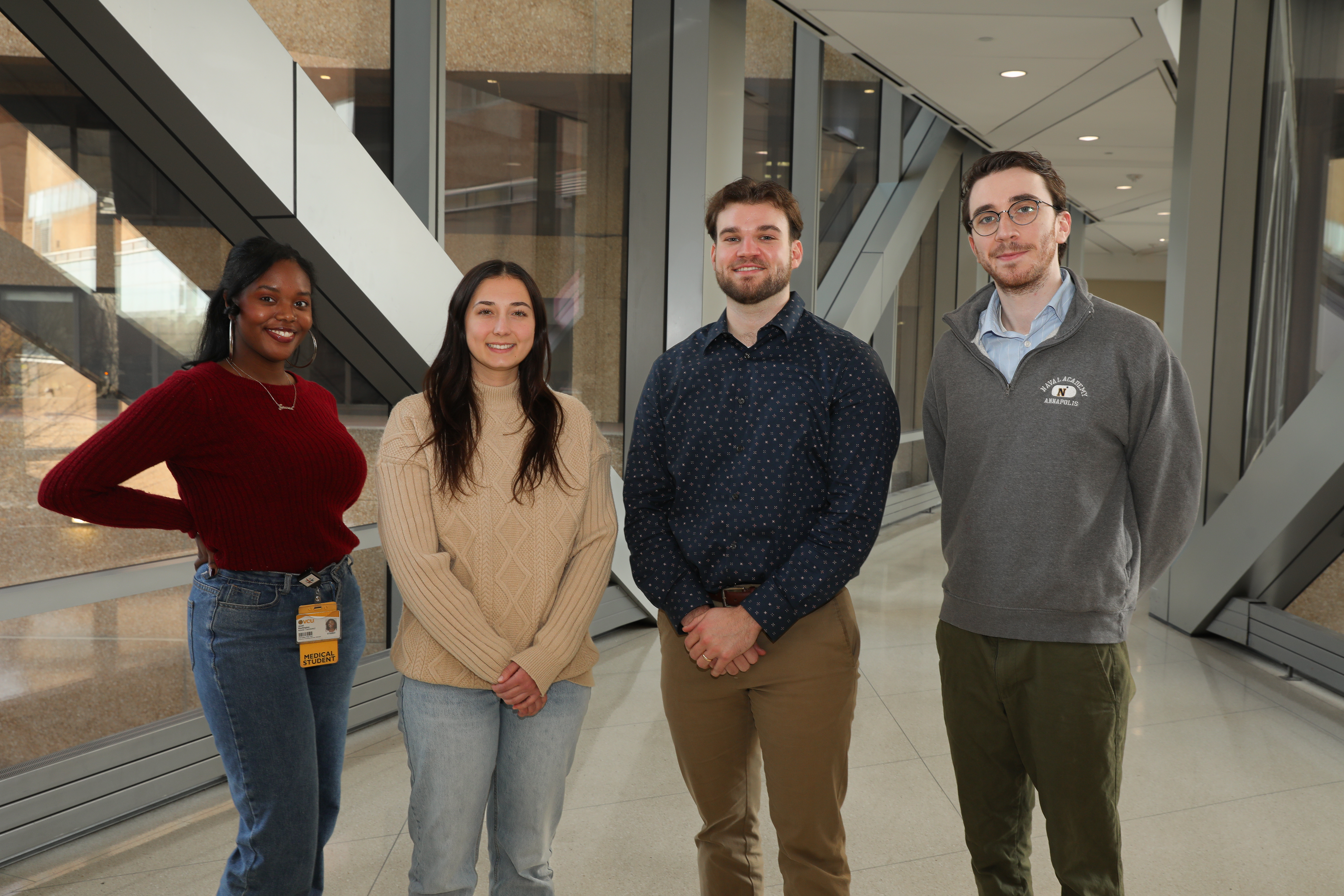 (From left) M4 Jewel Washington, M2s Noelle Johnson and Benjamin Vanderkwaak, and M1 Thomas Walker organized a donation drive and fundraisers to benefit hurricane relief efforts (Photo by Arda Athman, School of Medicine)
