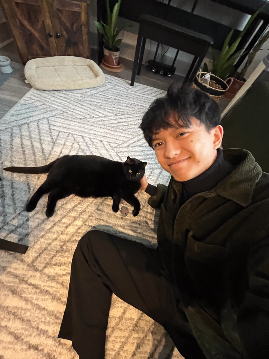  Benjamin Angeles adopted his first pet, Matcha the cat, to be his companion during his post-baccalaureate education. 