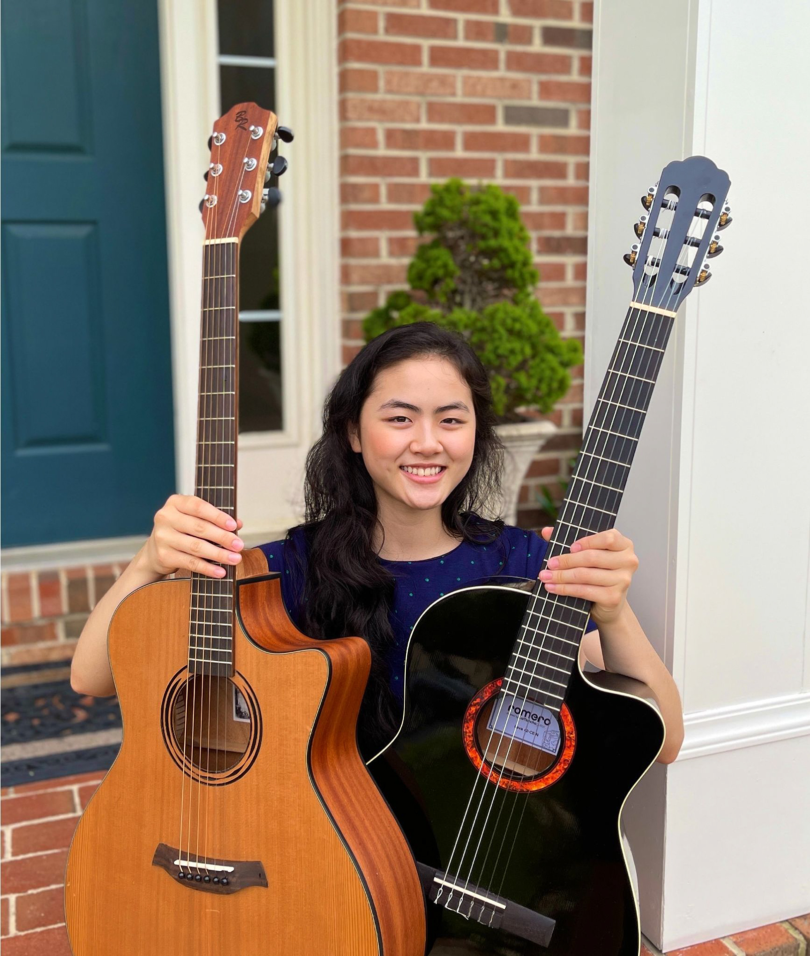  Lauren Young plays fingerstyle guitar and loves learning and arranging songs by ear. 