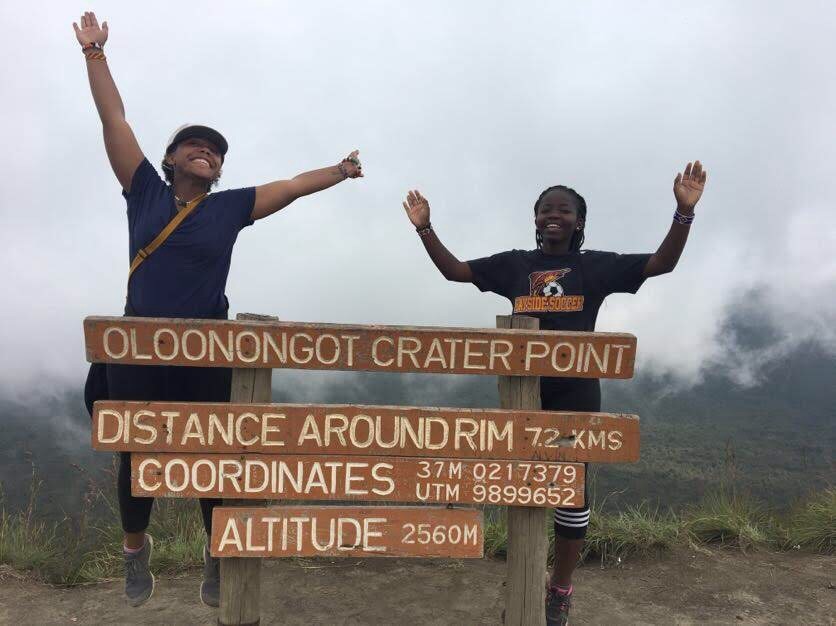  Zshonel Auma (right) once rode an ostrich in Kenya, where she also hiked Mt. Longonot. 