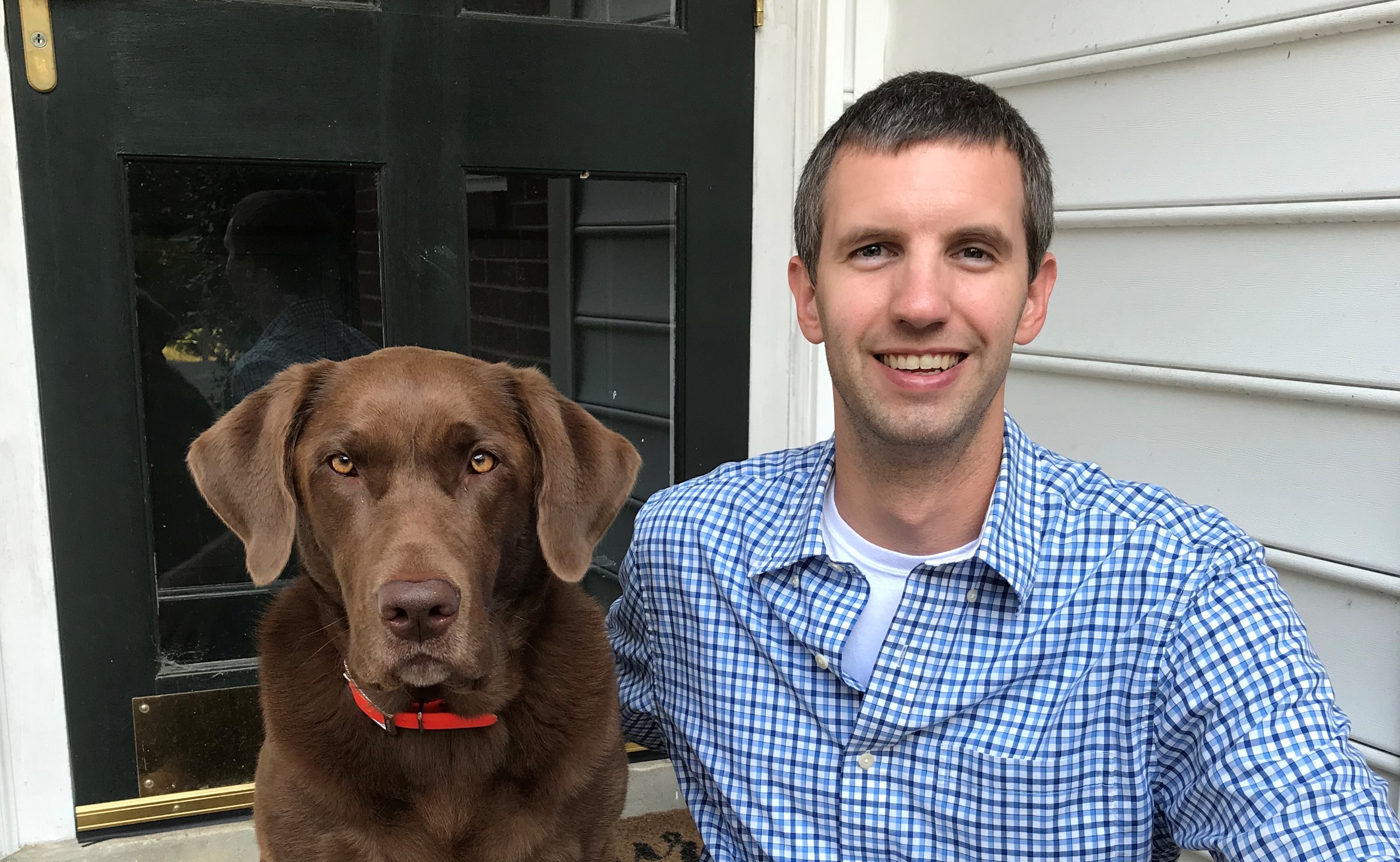  Eric Donley and his chocolate lab, Georgia, are a therapy team with VCU Dogs on Call. 