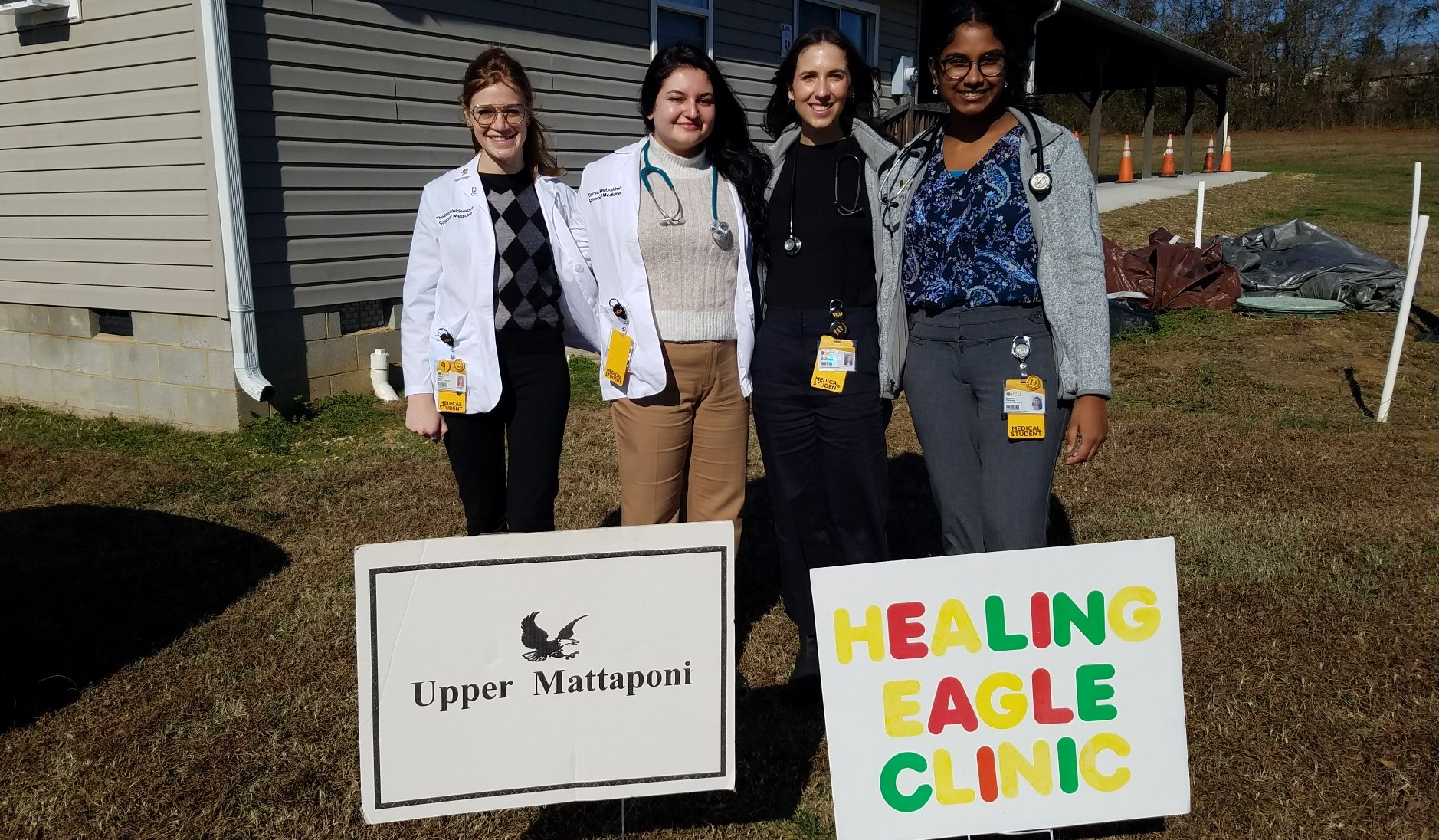 VCU School of Medicine student volunteers: Therese Weidenkopf, M1 (far left), Draya Mirebrahimi, M1 (second from left), Sarah Whitaker, M1 (second from right), Pratyusha Chalurali, M2 (far right)