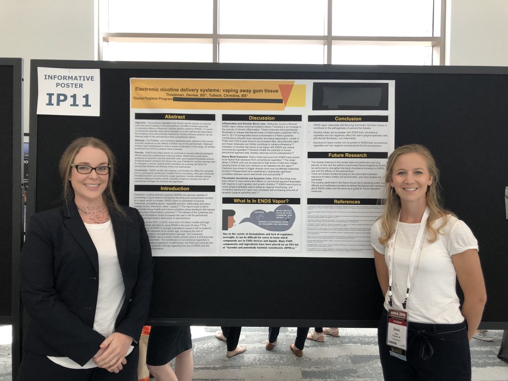 Denise Thieleman, left, and Christina Tulloch, right, presented “Electronic Nicotine Delivery Systems: vaping away gum tissue” and brought home a 1st place win.