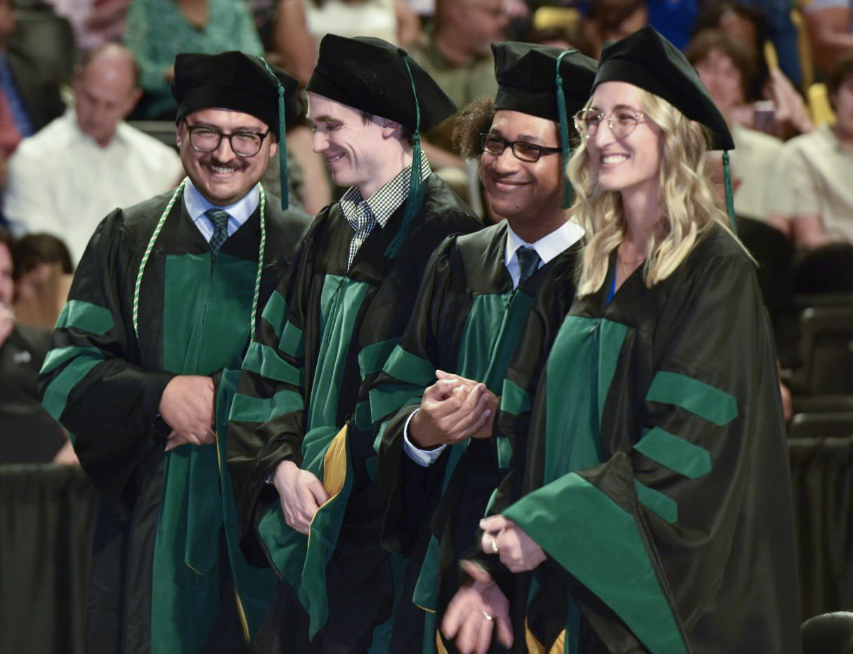 Students at hooding ceremony