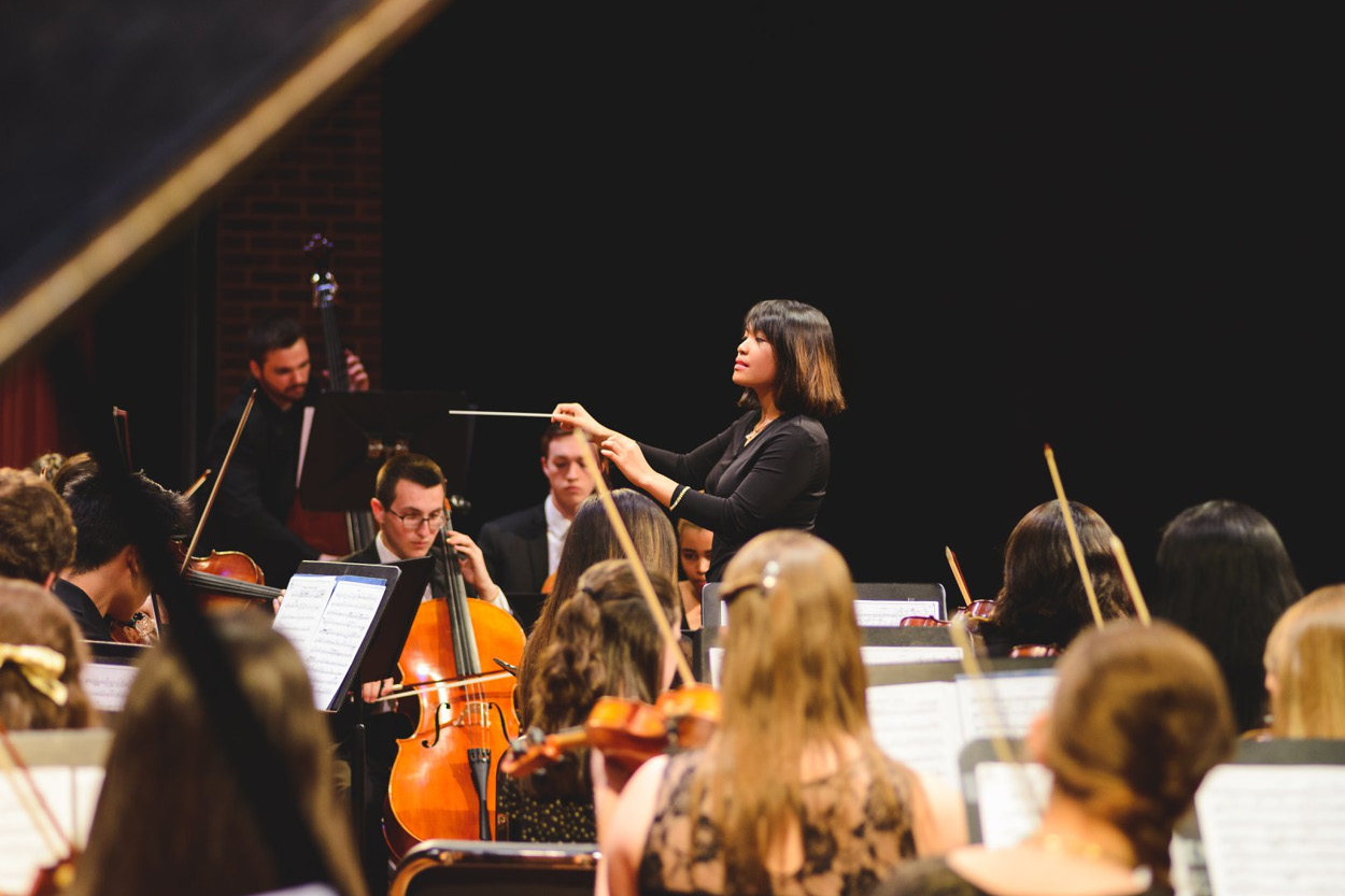  Christia Aspili served as a symphony orchestra conductor during college. 