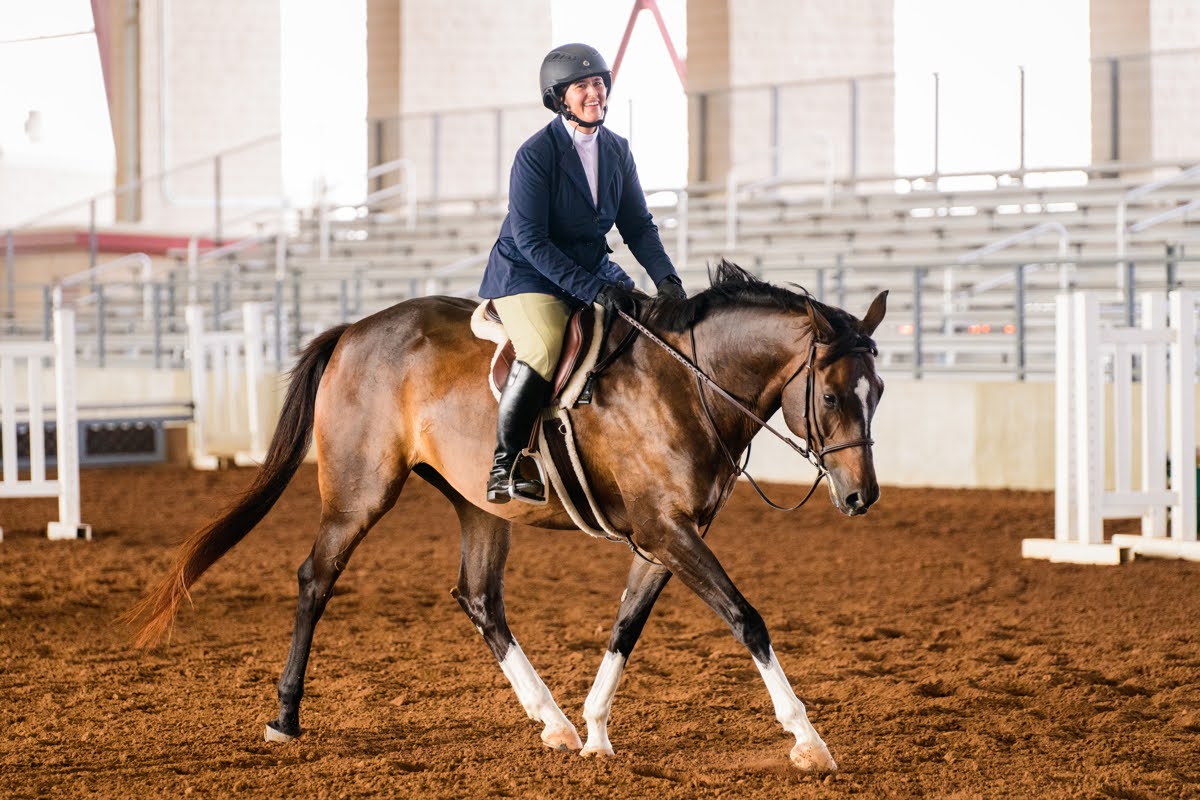  Theresa Jones Pugh, M'01, and Teddy, her favorite horse 