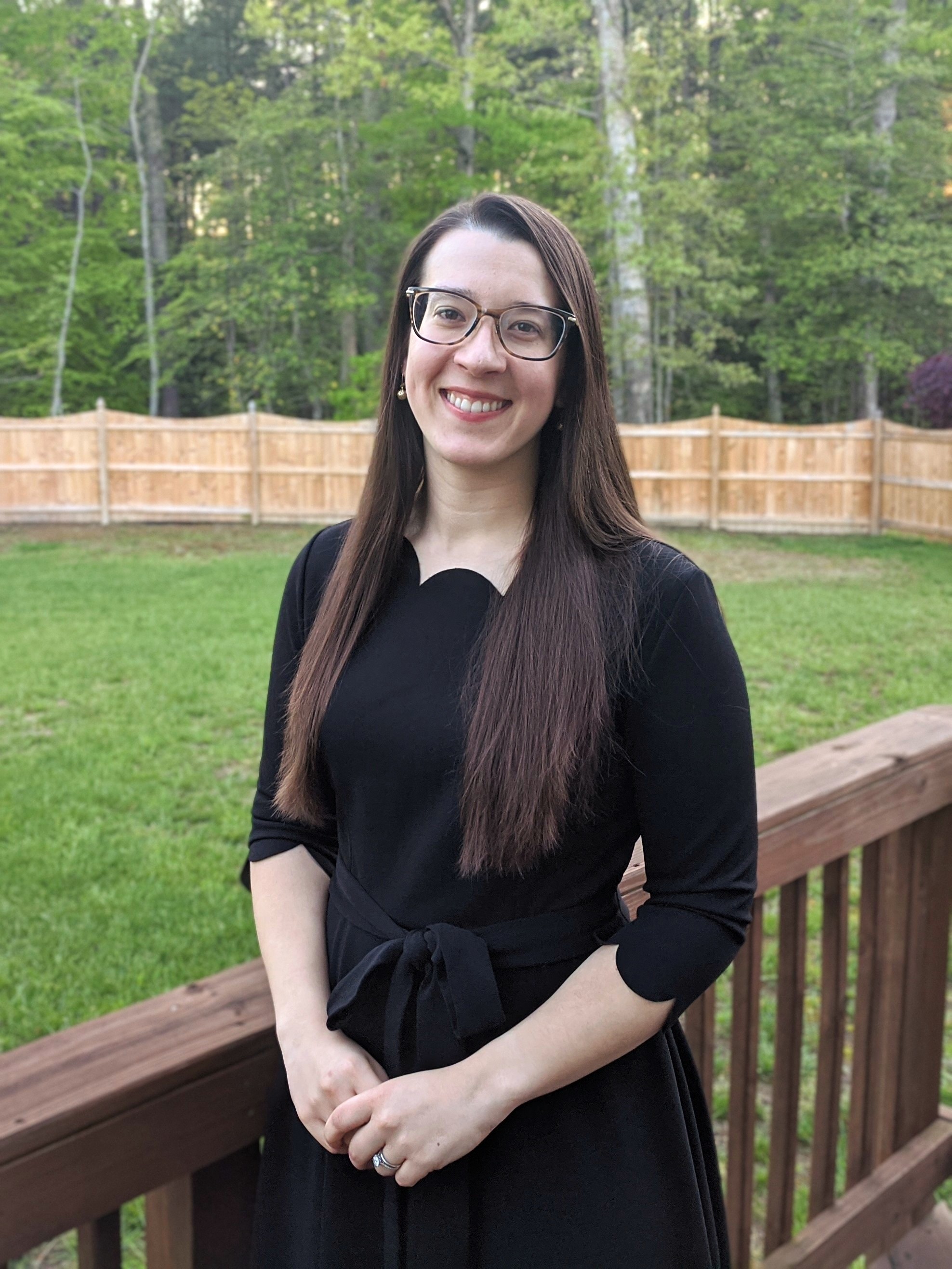 M20 Janina Pearce smiling on a backyard deck