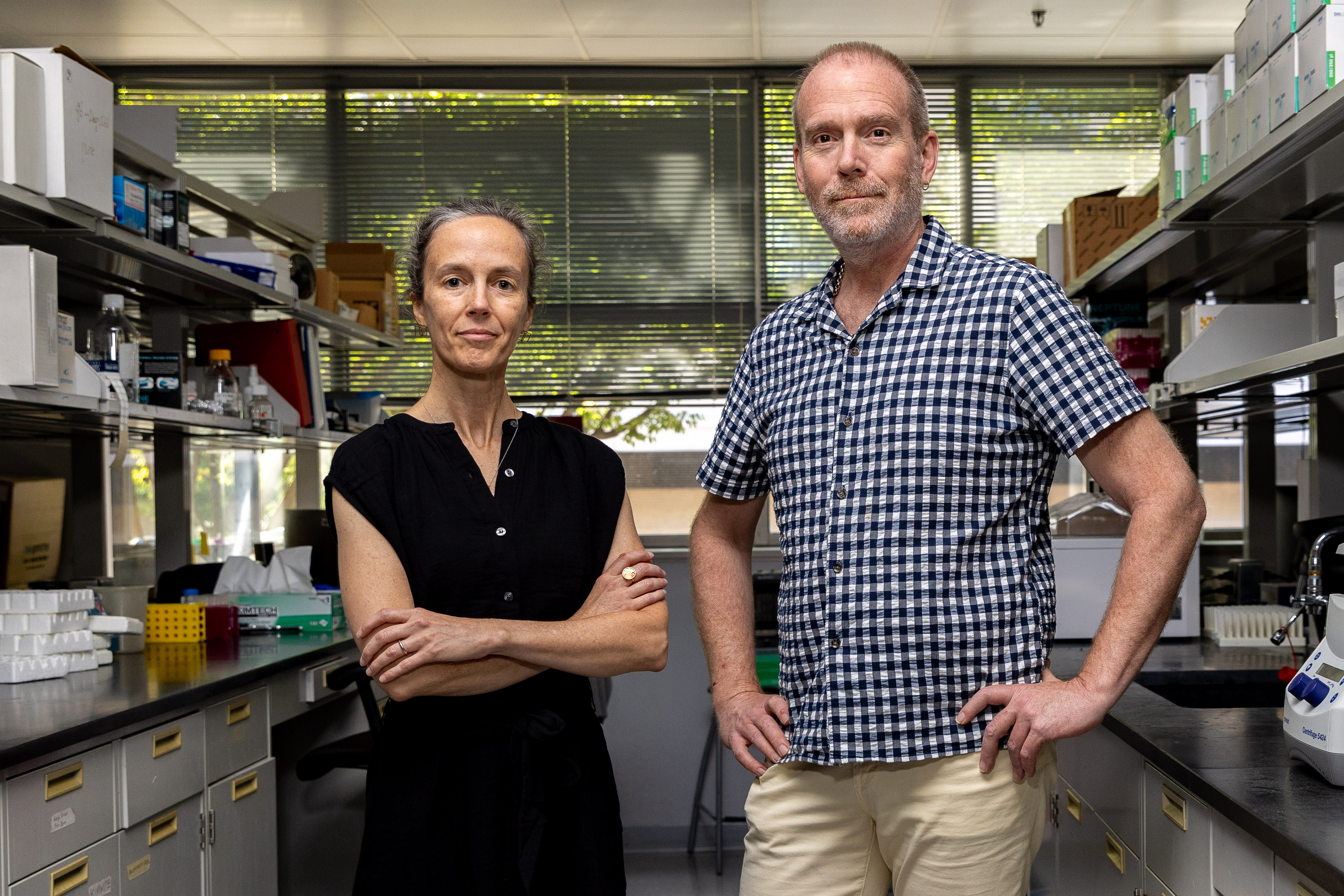 Alexis C. Edwards, Ph.D. (left), and Brien P. Riley, Ph.D. (right), are researchers at the Virginia Institute for Psychiatric and Behavioral Genetics at VCU. Their genetic investigations of substance abuse, suicide and schizophrenia offer hope to patients and families living with a variety of conditions. (Photo by Skip Rowland)