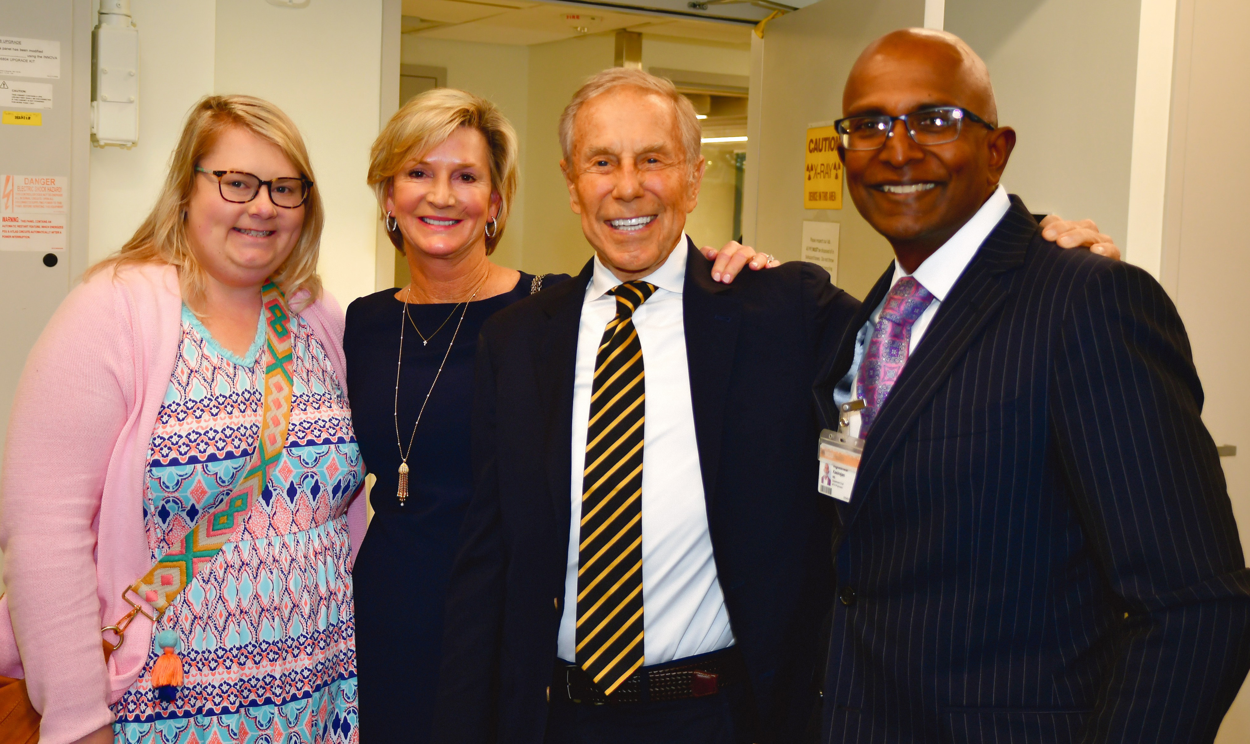 A $1 million gift from Christy and David Cottrell (center) led the way for a $5 million renovation to establish a Surgical Innovation Suite that now bears their name. The couple is flanked by daughter Leah Rose (left) and Vigneshwar Kasirajan, M.D., Stuart McGuire Chair of the VCU Department of Surgery (right). (Photo by Joe Morris)