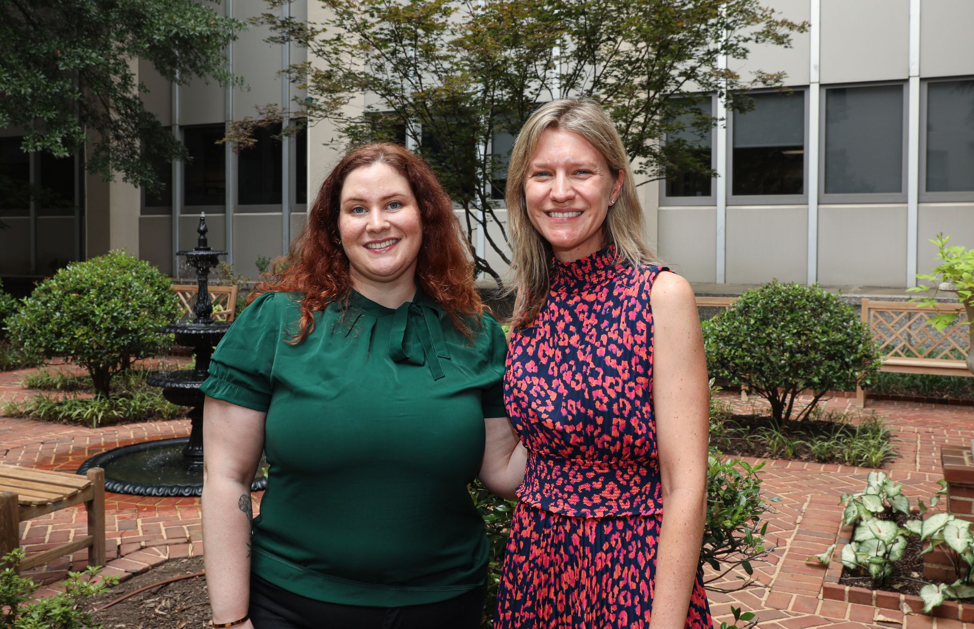 Emma Parolisi, M.D. (left), a PGY-3 in the neurology residency program, began shadowing Kelly Gwathmey, M.D. (right) 12 years ago. Now, the mentor and mentee are colleagues in the Department of Neurology. (Photo by Arda Athman, VCU School of Medicine)