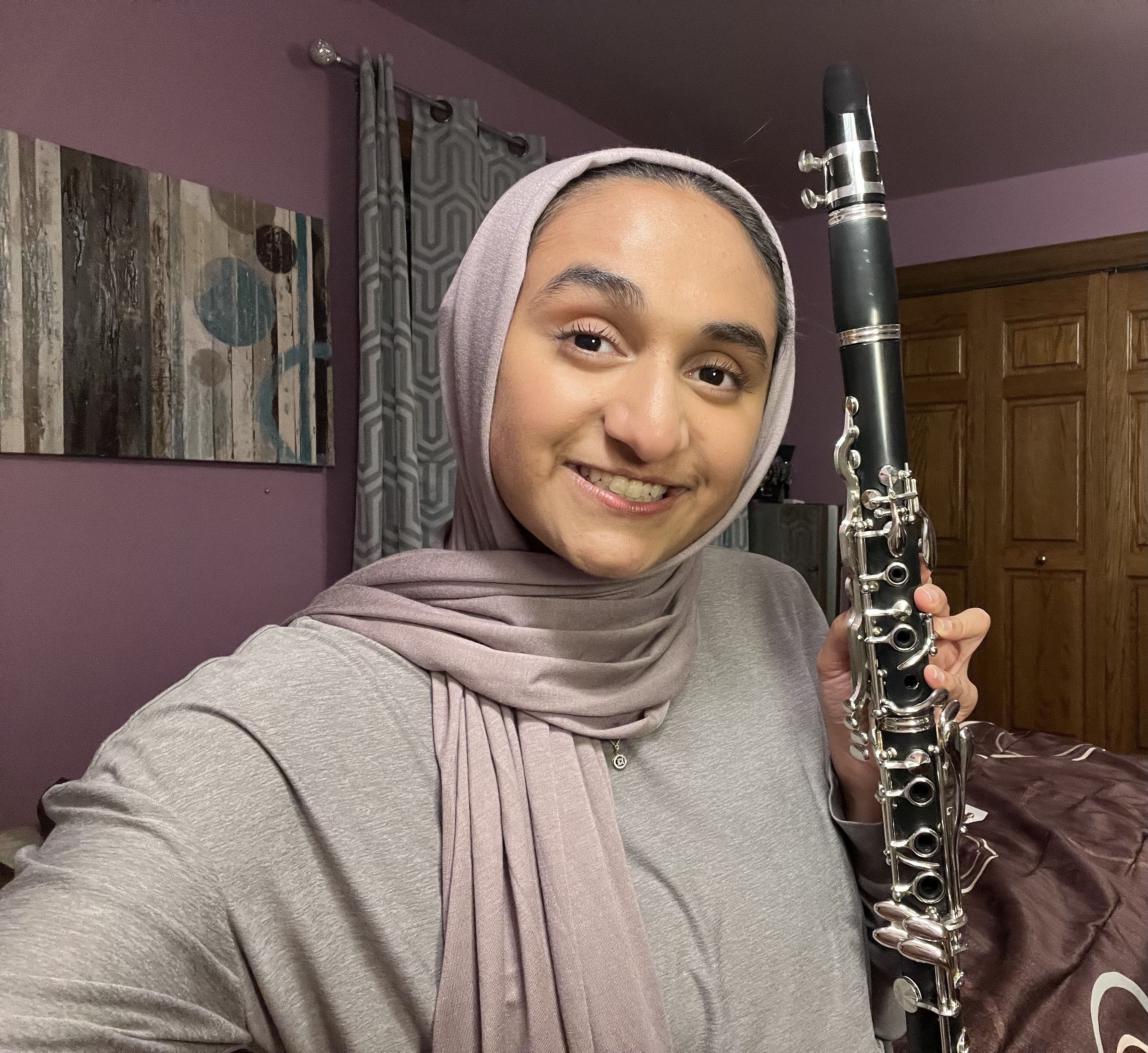  Emaan Dawood has played the clarinet for 11 years and was part of her college's pep band. 