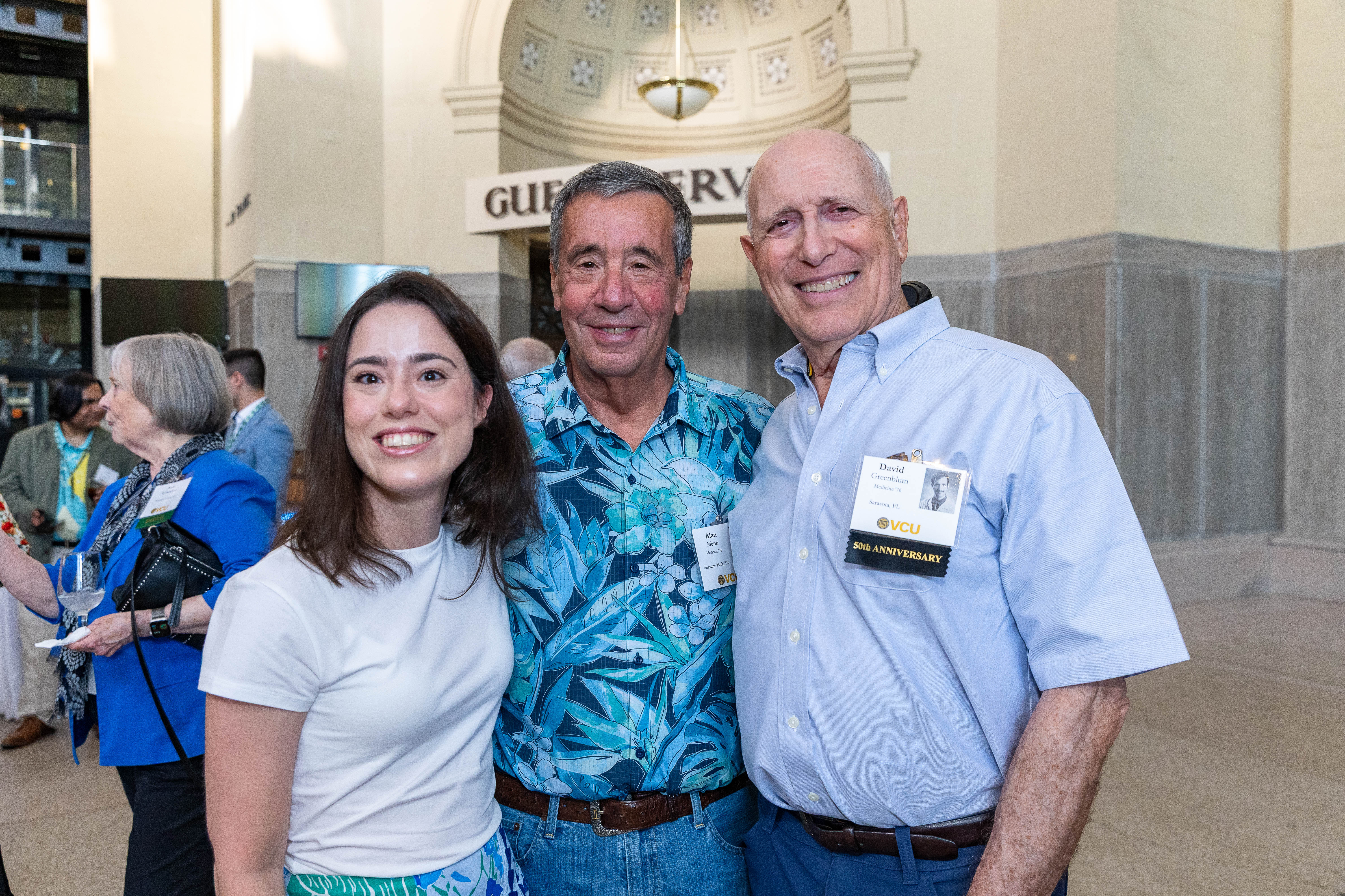  Alumni attend the welcome reception, hosted by the dean. 