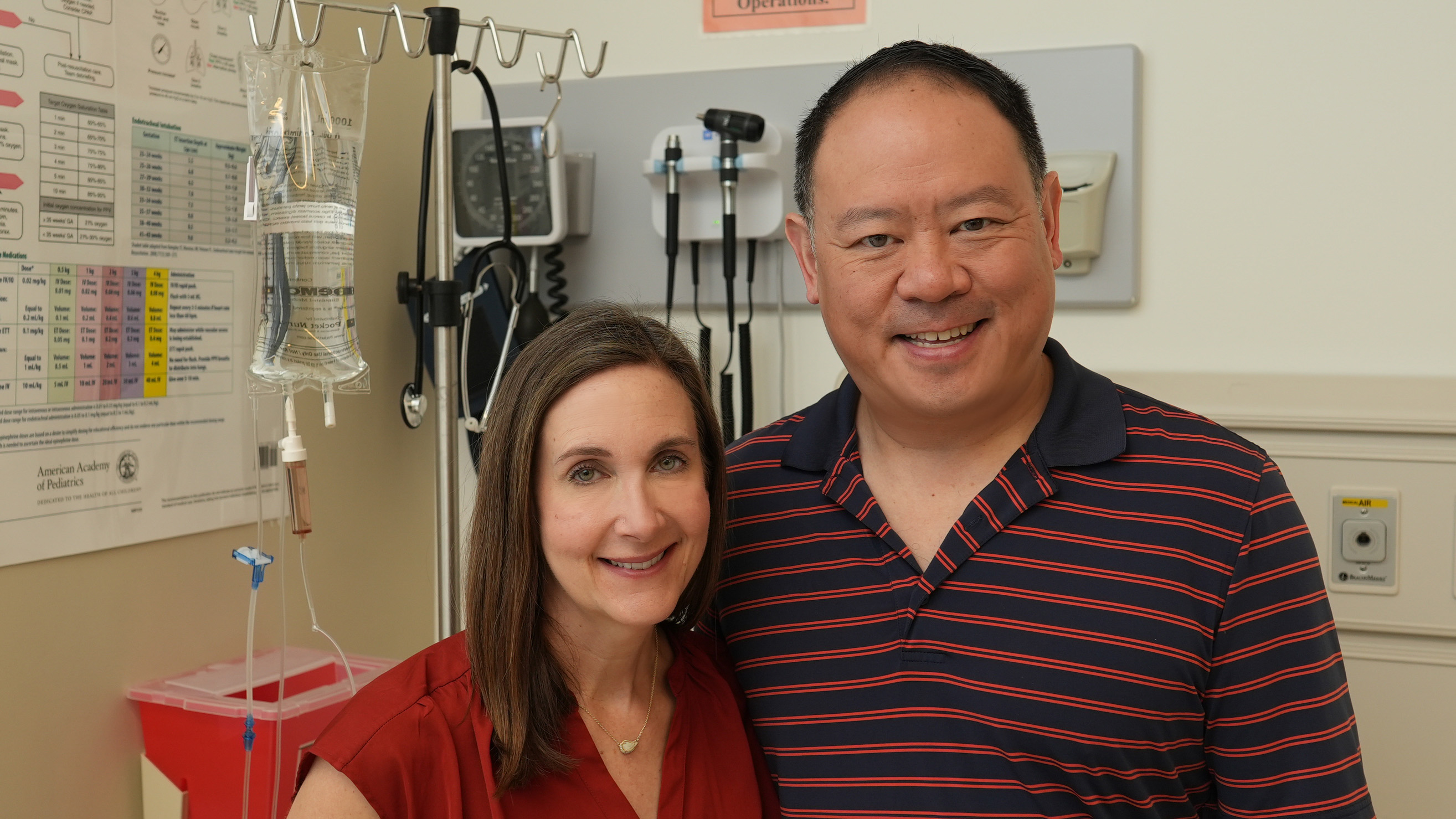 Tara L. Lin, M’00 (left), with husband and classmate Jim Lin, M’00, toured the Center for Human Simulation and Patient Safety.