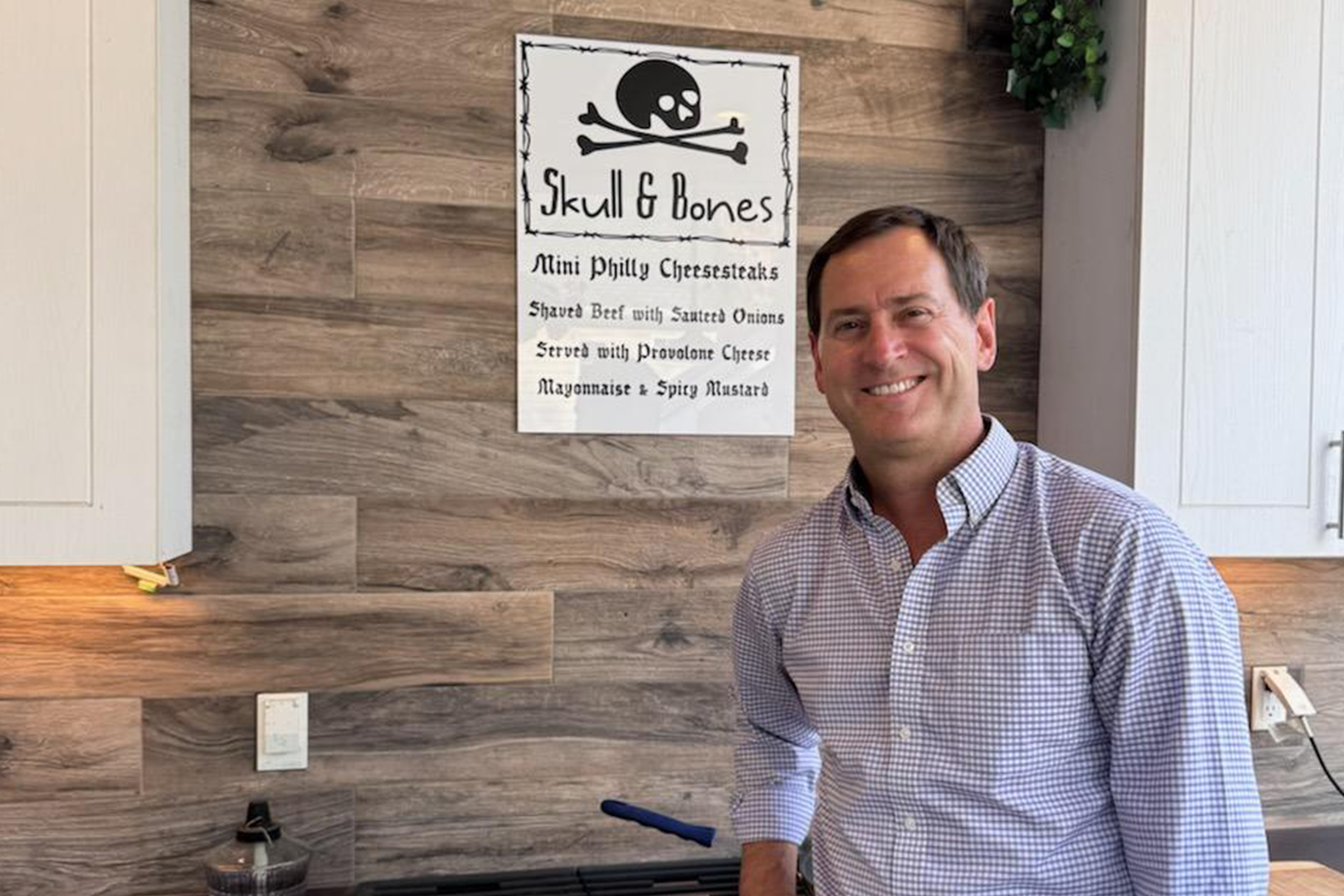 Class of 1995 reunion co-chair Cary Gentry, M’95, hosted his class party with a Skull and Bones restaurant theme.