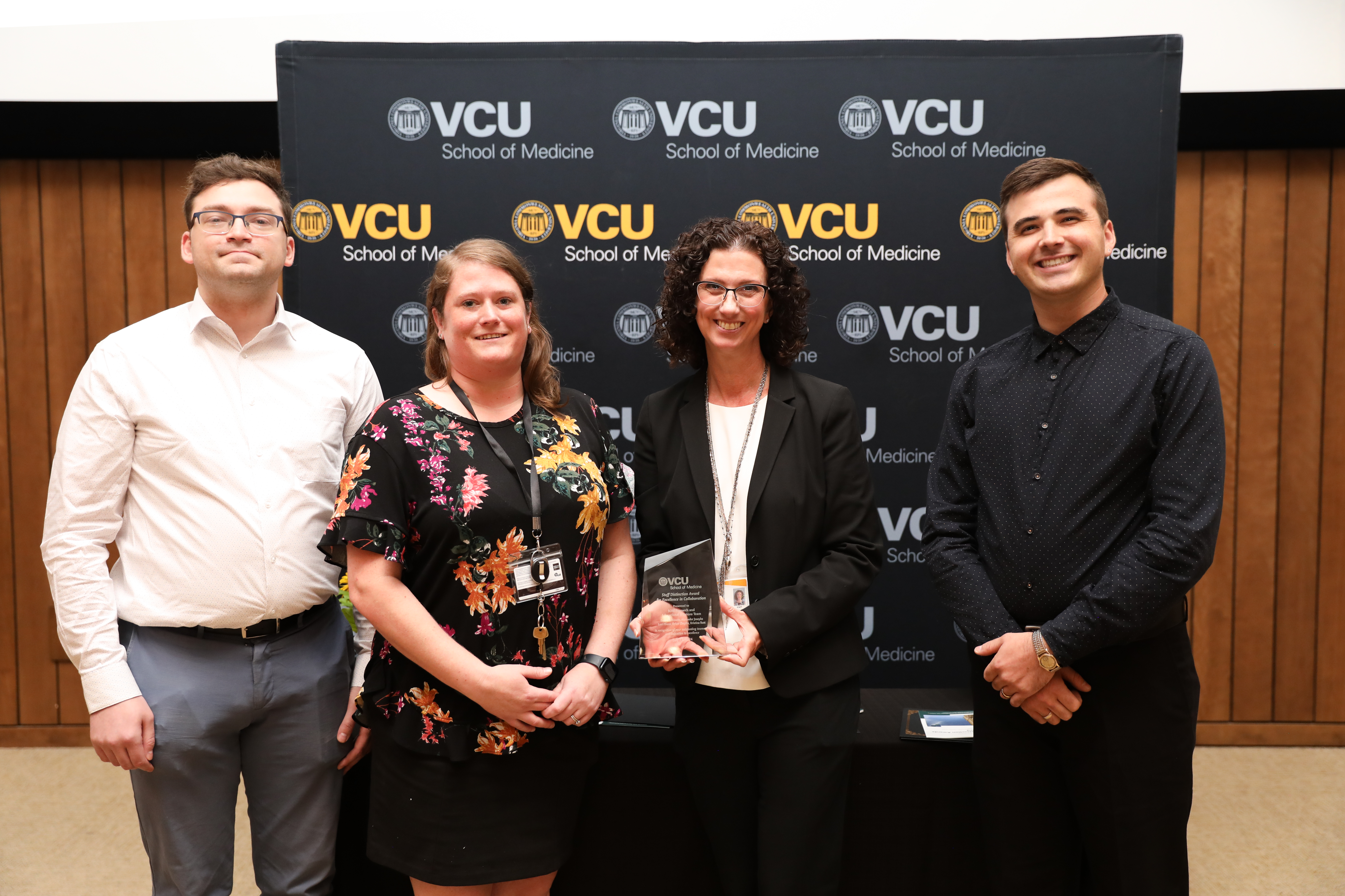 Left to right: Dylan Chaplin, Emma Robinson, Lori Pfister and Alex Josephs are the recipients of this year's Excellence in Collaboration Award. 