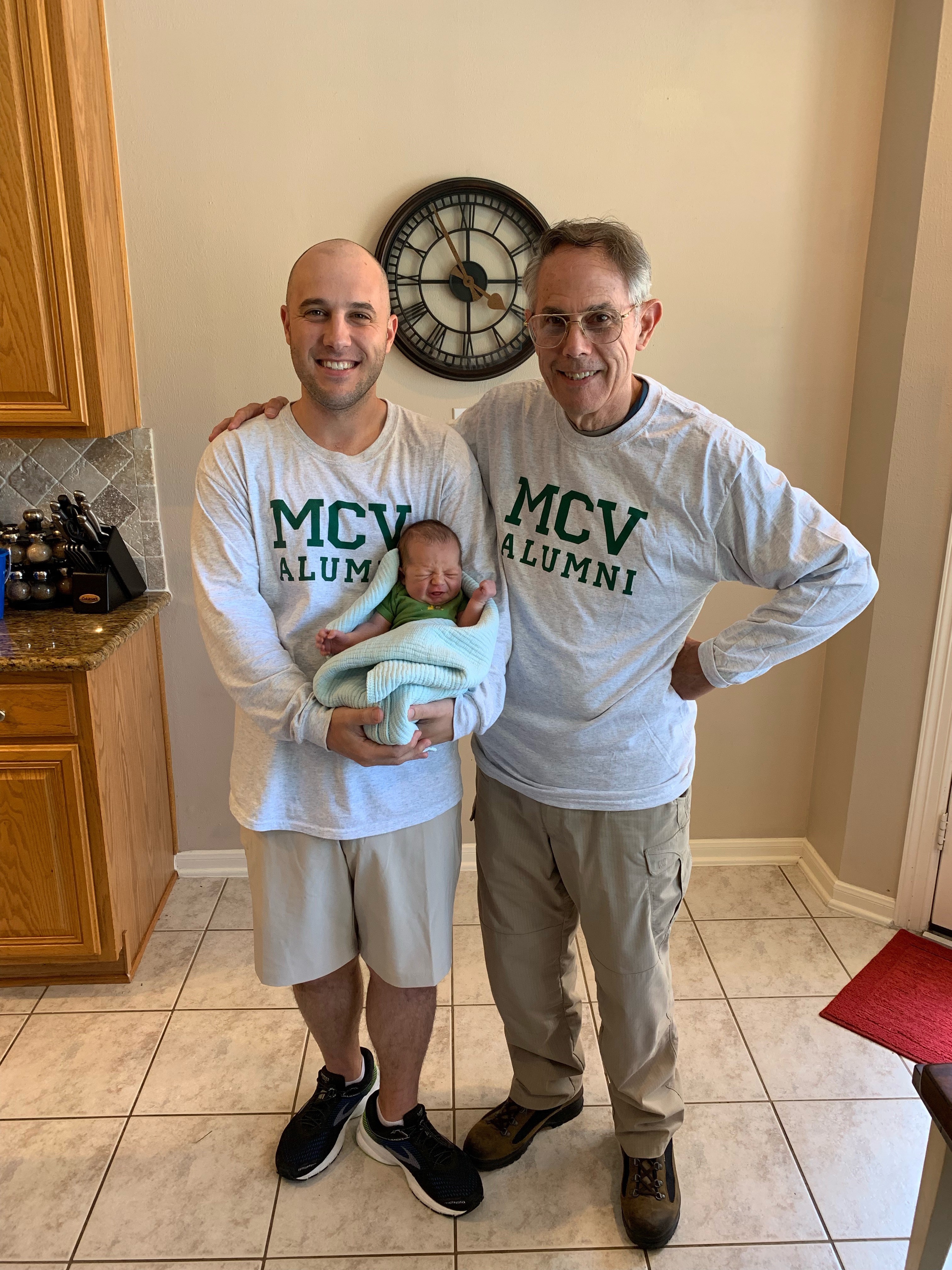 M13 Jeremy Ross holding son Aaron and standing next to father M71 Michael Ross