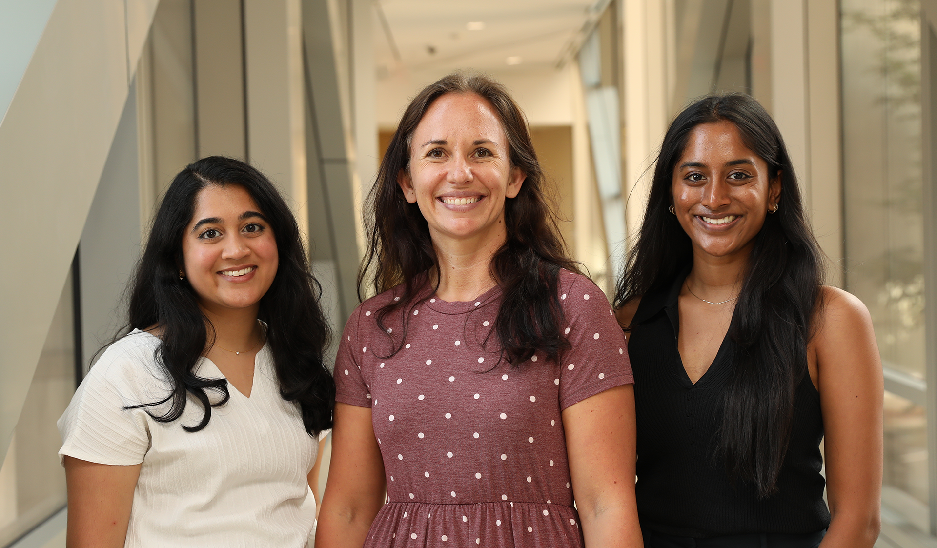 M2s Sriya Kongala (left) and Shivani Mullapudi (right), pictured with Kira Shifflett, VCU Medical Center’s trauma outreach coordinator, volunteer with the Trauma Survivors Network to help patients mentally recover after a physical injury. (Photo by Arda Athman)