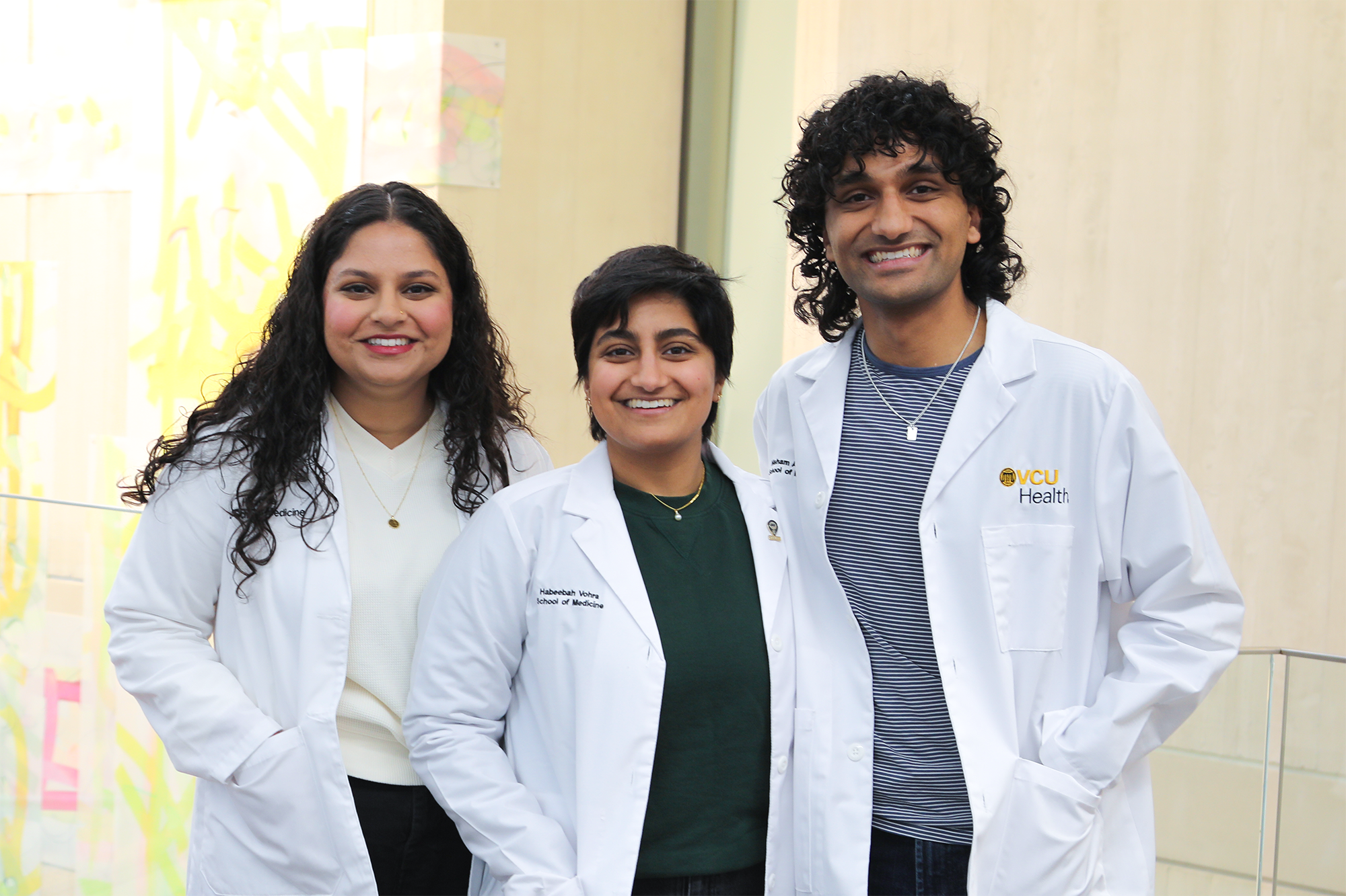 Hiba, Habeebah and Hisham Vohra (left to right), are all attending the School of Medicine at the same time. (Photo by Arda Athman, School of Medicine)