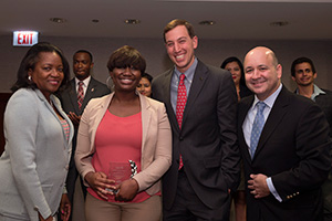 From left to right: Niva Lubin-Johnson, M.D., at-large representative of AMA Minority Affairs; Baaba Blankson, M’17, holding her AMA Minority Scholars Award; Jesse Ehrenfield, M.D., M.P.H., AMA board of trustees member; and Michael Flesher, a representative from Pfizer.