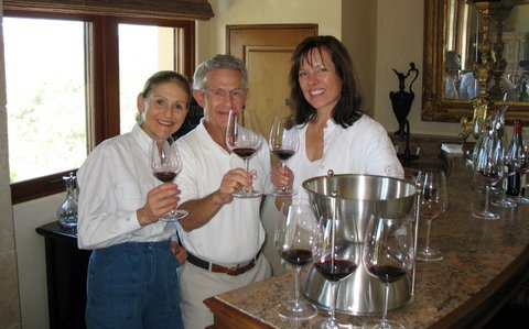 Marvin Frank, M’65 (center), and his wife Marsha (left) with Ann Colgin, a vintner who founded Colgin Cellars in Napa Valley.