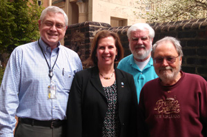 While on campus, Margaret “Kenny” Offermann, M’80, PhD’81, reconnected with (left to right) biochemistry professors Mac Grogan, Ph.D., Bob Diegelmann, Ph.D. and Keith Shelton, Ph.D.