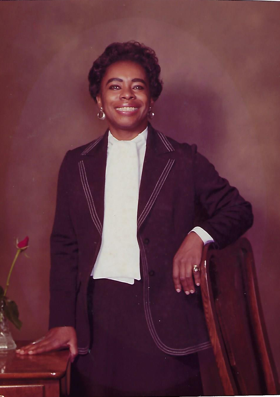 Norma Goodwin posing in a suit