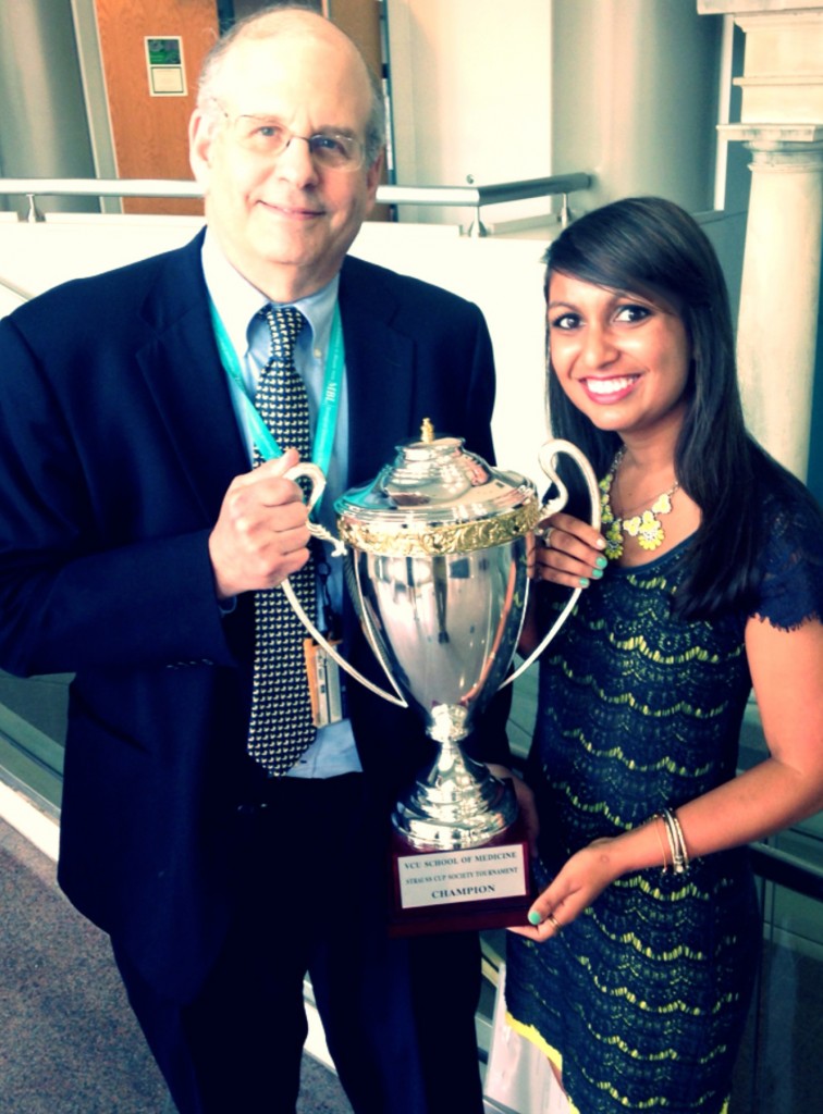 Class of 2016’s Shikha Gupta with Dean of Medicine Jerry Strauss, M.D., Ph.D. and the Strauss Cup