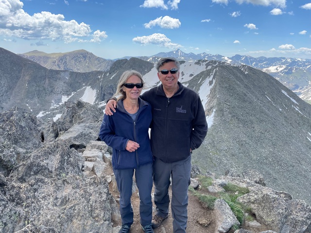 Caption: Christine (left) and Stephen Levin, M’79, pictured in Rocky Mountain National Park, endowed a scholarship to support medical students interested in pursuing a career in primary care, particularly caring for patients in underserved areas. Contributed photo.