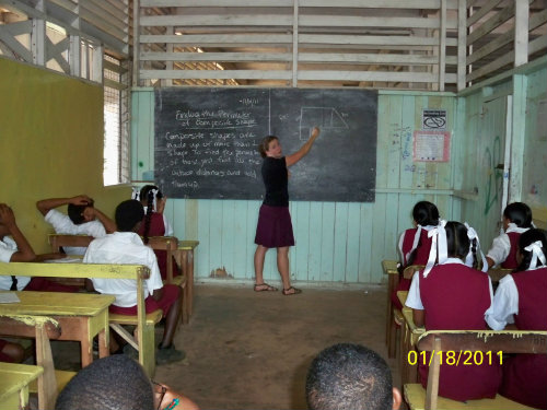 Suzanne at the front of a class, which sometimes held as many as 40 students